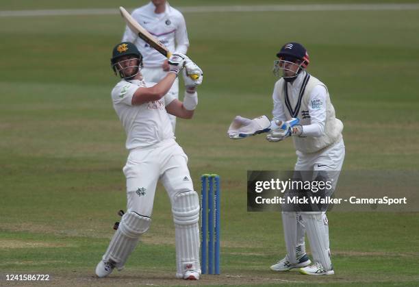 Nottinghamshire's Joe Clarke in action with Middlesex's John Simpson during the LV= Insurance County Championship match between Nottinghamshire and...