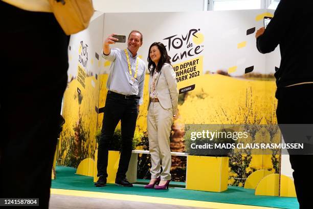 Tour de France General Director Christian Prudhomme takes a selfie during the official opening of the press center of the Tour de France cycling race...