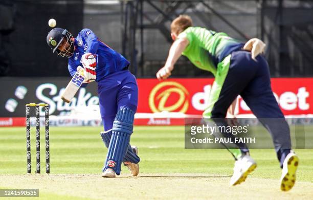 India's Deepak Hooda plays a shot during the second Twenty20 International cricket match between Ireland and India at Malahide cricket club, in...