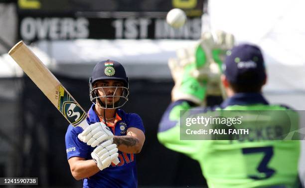 Ireland's Lorcan Tucker catches the ball to take the wicket of India's Ishan Kishan during the second Twenty20 International cricket match between...