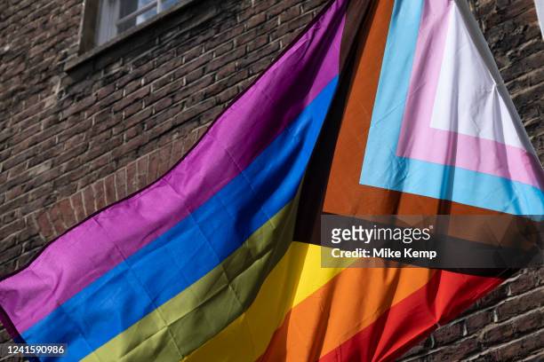 Pride Progress flag in Soho on 28th June 2022 in London, United Kingdom. The flag includes the rainbow flag stripes to represent LGBTQ+ communities,...