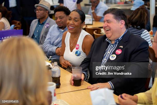 Illinois Governor J.B. Pritzker and Illinois Lieutenant Governor Juliana Stratton speak to supporters on Primary Day at Manny's Deli on June 28, 2022...