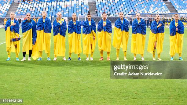 Women's Ukrainian soccer national team sing national anthem during the FIFA Women's World Cup 2023 Qualifier group B match between Ukraine and...