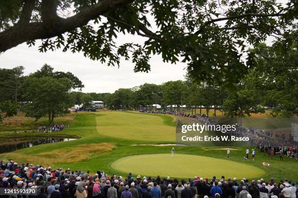 Wide angle view of Rory McIlroy in action, putting during Sunday play at The Country Club. Brookline, MA 6/19/2022 CREDIT: Erick W. Rasco