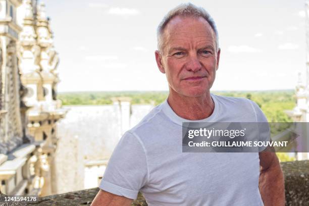 English musician and singer-songwriter Gordon Sumner known by his stage name Sting poses prior to his live show at the Chambord Castle, central...