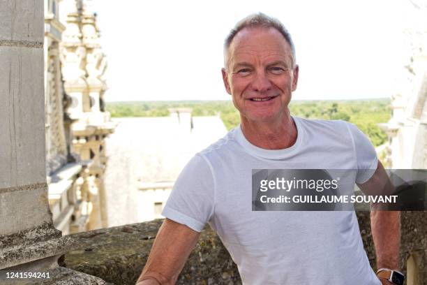 English musician and singer-songwriter Gordon Sumner known by his stage name Sting poses prior to his live show at the Chambord Castle, central...