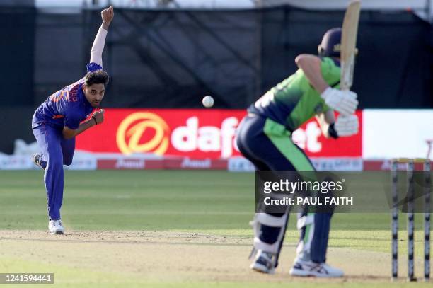 India's Bhuvneshwar Kumar bowls during the second Twenty20 International cricket match between Ireland and India at Malahide cricket club, in Dublin...