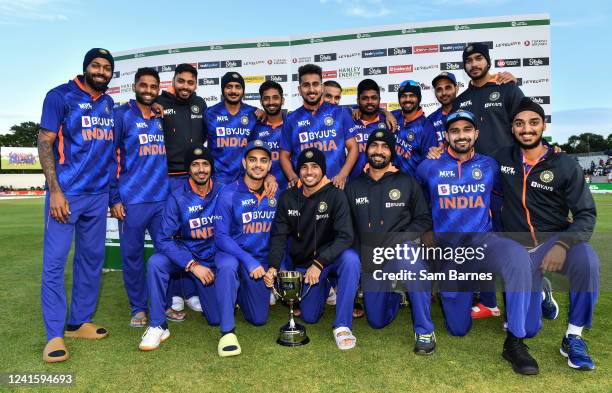 Dublin , Ireland - 28 June 2022; The India team celebrate with the trophy Stake.com Trophy after the LevelUp11 Second Men's T20 International match...