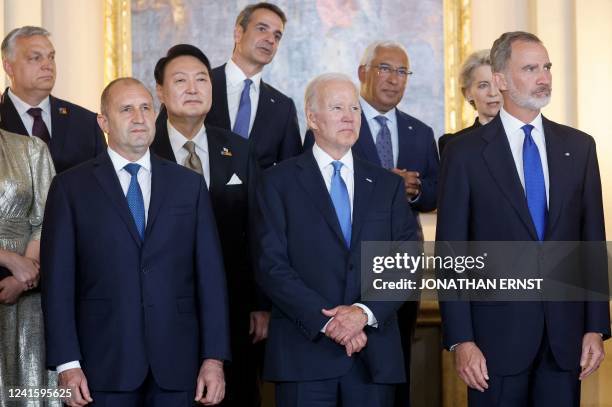 Spain's King Felipe poses for a family photo with US President Joe Biden , Bulgaria's President Rumen Radev , South Korea's President Yoon Suk-yeol ,...