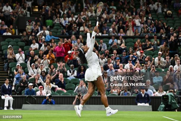 Player Serena Williams celebrates winning a point against France's Harmony Tan during their women's singles tennis match on the second day of the...