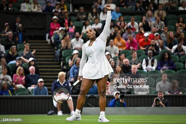 Player Serena Williams celebrates winning a point against France's Harmony Tan during their women's singles tennis match on the second day of the...