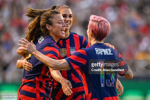 Sofia Huerta, Alex Morgan and Megan Rapinoe of the United States celebrate a goal during a game against Columbia at Rio Tinto Stadium on June 28,...