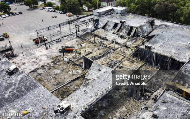 An aerial view of debris removal works at a destroyed shopping mall targeted by a Russian missile strike in Kremenchuk, Ukraine, June 29th, 2022.