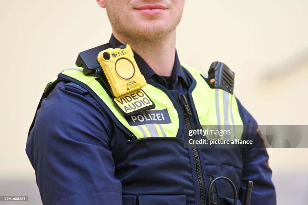 Ppe In Police A police officer wears a bodycam and an SK1 protective vest, taken at ...