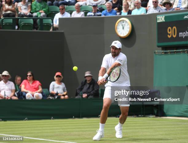 Steve Johnson of United States of America in his Men's Singles Second Round match against Ryan Peniston of Great Britain during day three of The...