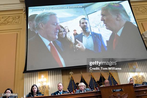 Former White House Chief of Staff Mark Meadows, Kimberly Guilfoyle, Donald Trump Jr., and former President Donald Trump, are seen on a monitor as...