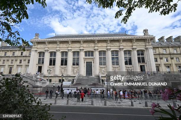 Civil parties and journalists arrive at the Special Assize Court of Paris at the Palais de Justice courthouse in Paris, on June 29 ahead of the...