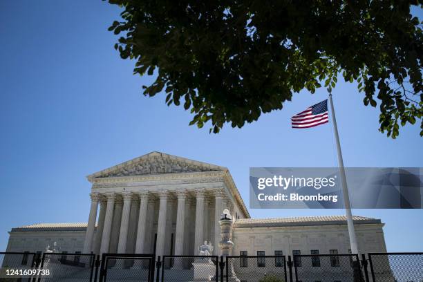 Security fencing outside the US Supreme Court in Washington, D.C., US, on Wednesday, June 29, 2022. By overturning the abortion-rights decision Roe...