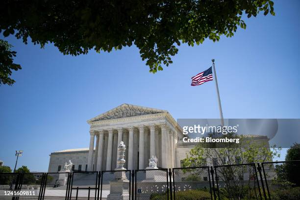 Security fencing outside the US Supreme Court in Washington, D.C., US, on Wednesday, June 29, 2022. By overturning the abortion-rights decision Roe...