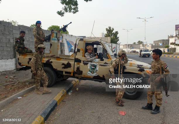 Fighters affiliated with Yemen's separatist Southern Transitional Council deploy around the site of a reported explosion in the Khormaksar area of...