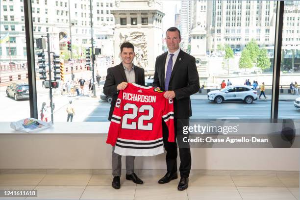 General Manager Kyle Davidson of the Chicago Blackhawks poses for a photo with Luke Richardson after introducing him as the team's new head coach at...