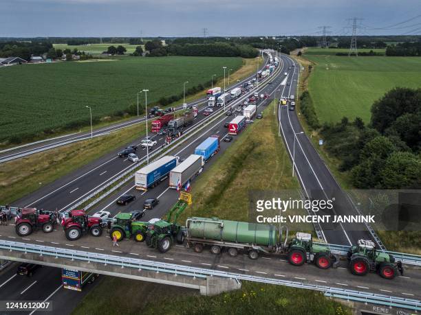 Farmers and citizens block the A37 highway, during a protest against the Dutch government's plans to cut nitrogen emissions, near Emmen on June 29,...