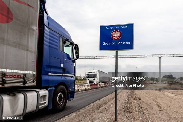 Lorry carrying goods passes the Polish border sign to enter Poland on June 29, 2022 at Polish-Lituanian border on the busy E67 road. The Polish...