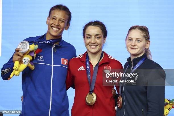 Turkish National wrestler Bediha Gun poses after winning the gold medal in the women's 57kg wrestling category at the 19th Mediterranean Games in...