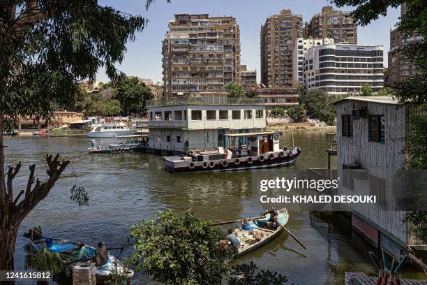 One of the houseboats usually moored across one of the banks of the Nile river between the Zamalek district of Egypt's capital Cairo and the Agouza...