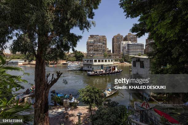 One of the houseboats usually moored across one of the banks of the Nile river between the Zamalek district of Egypt's capital Cairo and the Agouza...