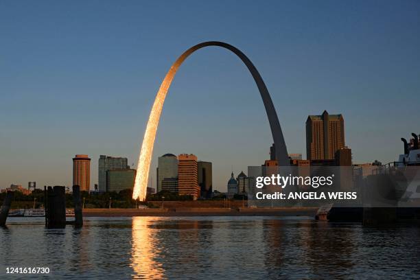 The Gateway Arch of St. Louis, Missouri, and the Mississippi River as seen from East St. Louis, Illinois, on June 27, 2022. Abortion is now banned in...