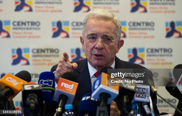Colombia's former president Alvaro Uribe Velez speaks during a press conference after meeting with Colombia's president-elect Gustavo Petro, in...
