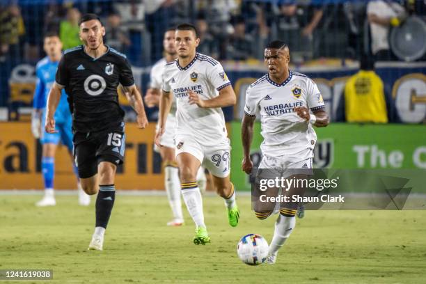 Douglas Costa of Los Angeles Galaxy controls the ball during the game against Minnesota United at Dignity Health Sports Park on June 28, 2022 in...