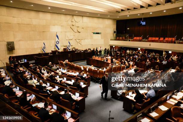 This picture shows a general view of the Israeli Knesset during a meeting, in Jerusalem on June 30, 2022. - Israeli lawmakers dissolved parliament...