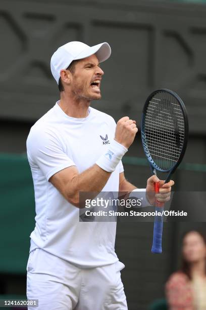 Andy Murray celebrates during his Gentlemen's Singles 2nd Round match against John Isner during day three of The Championships Wimbledon 2022 at All...