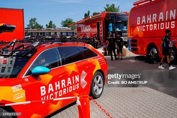 Members of Bahrain Victorious racing team are seen outside the Hotel Scandic in Glostrup, Denmark, on June 30 after the hotel was raided in the...