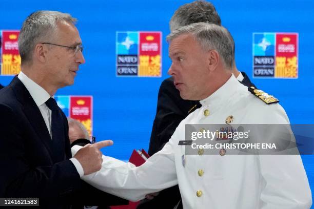 S Chair of the Military Committee, Admiral Rob Bauer talks with NATO Secretary General Jens Stoltenberg at the start of the last day of the NATO...