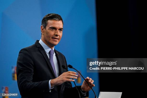 Spain's Prime Minister Pedro Sanchez addresses media representatives during a press conference at the NATO summit at the Ifema congress centre in...