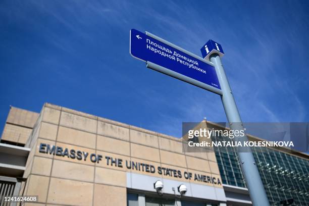 Picture taken on June 30, 2022 shows a street banner read as "Donetsk People Republic's square" in front of US embassy in Moscow. - Moscow officials...