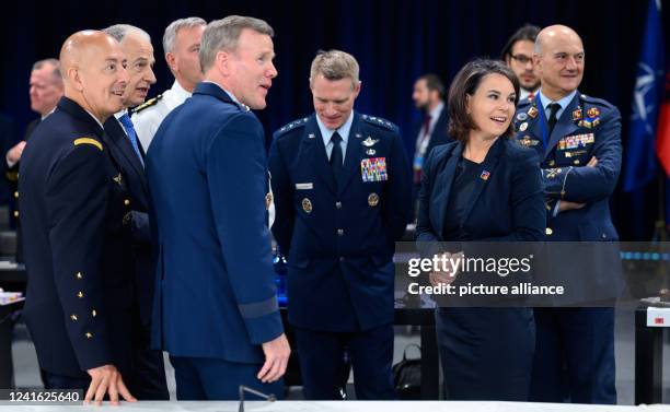 June 2022, Spain, Madrid: Annalena Baerbock , Foreign Minister, talks with Mircea Geoana , Nato Deputy Secretary General, and the senior Nato...