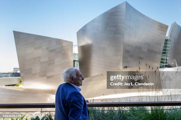 Los Angeles, CA Acclaimed architect Frank Gehry is photographed in an outdoor lounge area of the bar, Sed, part of Conrad Los Angeles, a luxury hotel...