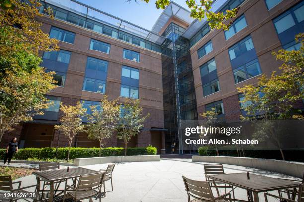 Person walks past the Donald Bren School of Information and Computer Sciences, located in the Bren Hall building at UCI, Irvine, CA on Wednesday,...