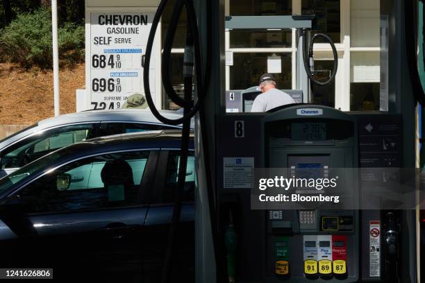 Tourists refuel their vehicles at a Chevron gas station in Yosemite National Park, California, US, on Wednesday, June 29, 2022. By 2032, the US...