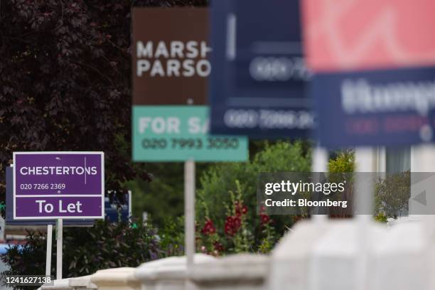 Estate agent "To Let" and "For Sale" signs outside residential properties in London, UK, on Thursday, June 30, 2022. UK house prices slowed more than...