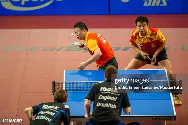 Action involving Ma Lin and Wang Hao of China against Paul Drinkhall and Liam Pitchford of England during the men's doubles in the ITTF Pro Tour...