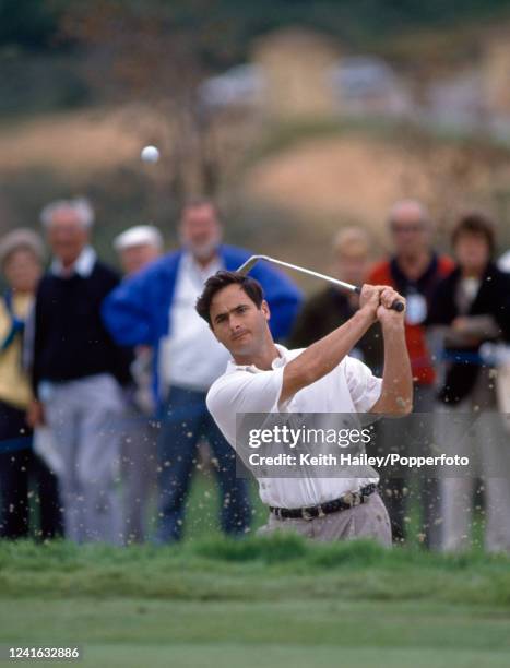 British professional golfer David Feherty hitting out of a bunker during the Volvo Masters Golf Tournament at the Real Club Valderrama in Sotogrande,...