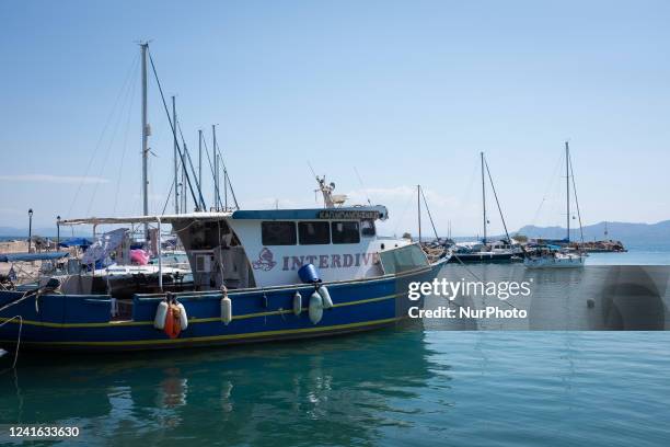 Boats at Megalochori-Myloi port in Agistri Island on June 30, 2022.