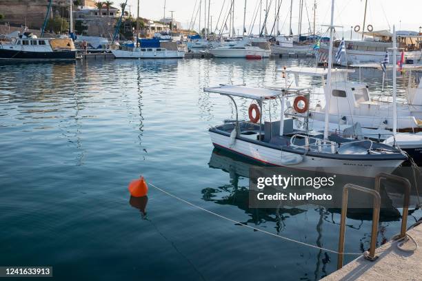 Boats at Megalochori-Myloi port in Agistri Island on June 30, 2022.