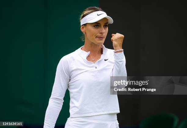 Ana Bogdan of Romania in action against Petra Kvitova of the Czech Republic in her second round match during Day Four of The Championships Wimbledon...