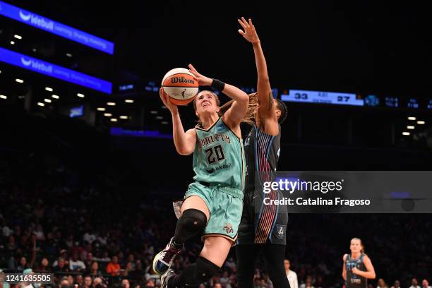Sabrina Ionescu of the New York Liberty drives to the basket during the game against the Atlanta Dream on June 30, 2022 at the Barclays Center in...